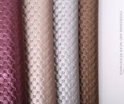 A row of different colors of leather fabric.