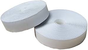 Two rolls of white tape on a white background.