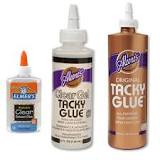 Tacky glue and clear glue are the best glues for glitter on fabric.